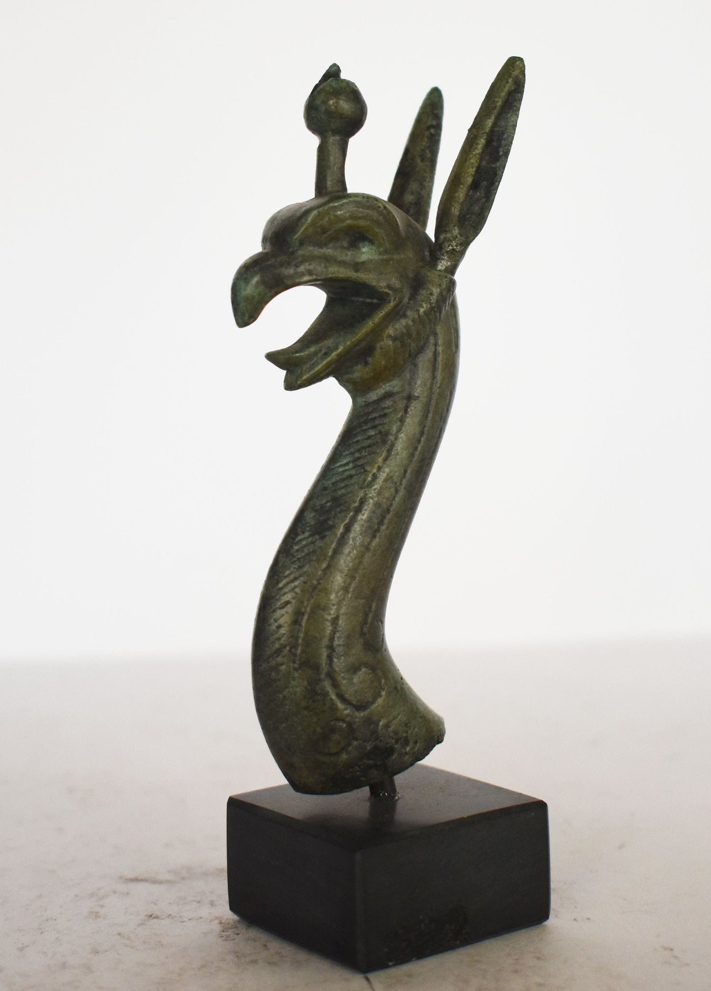 Griffin head bust - marble base - Ancient Greek legendary creature - Majestic, strong, and imbued with magic - Museum Replica - Bronze