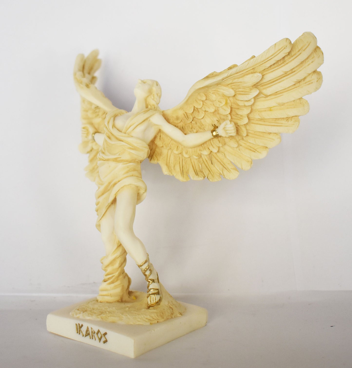Icarus - Son of Daedalus - Escape from Crete with Wings from Wax and Drowned - Don't Fly Too Close to the Sun - aged alabaster statue