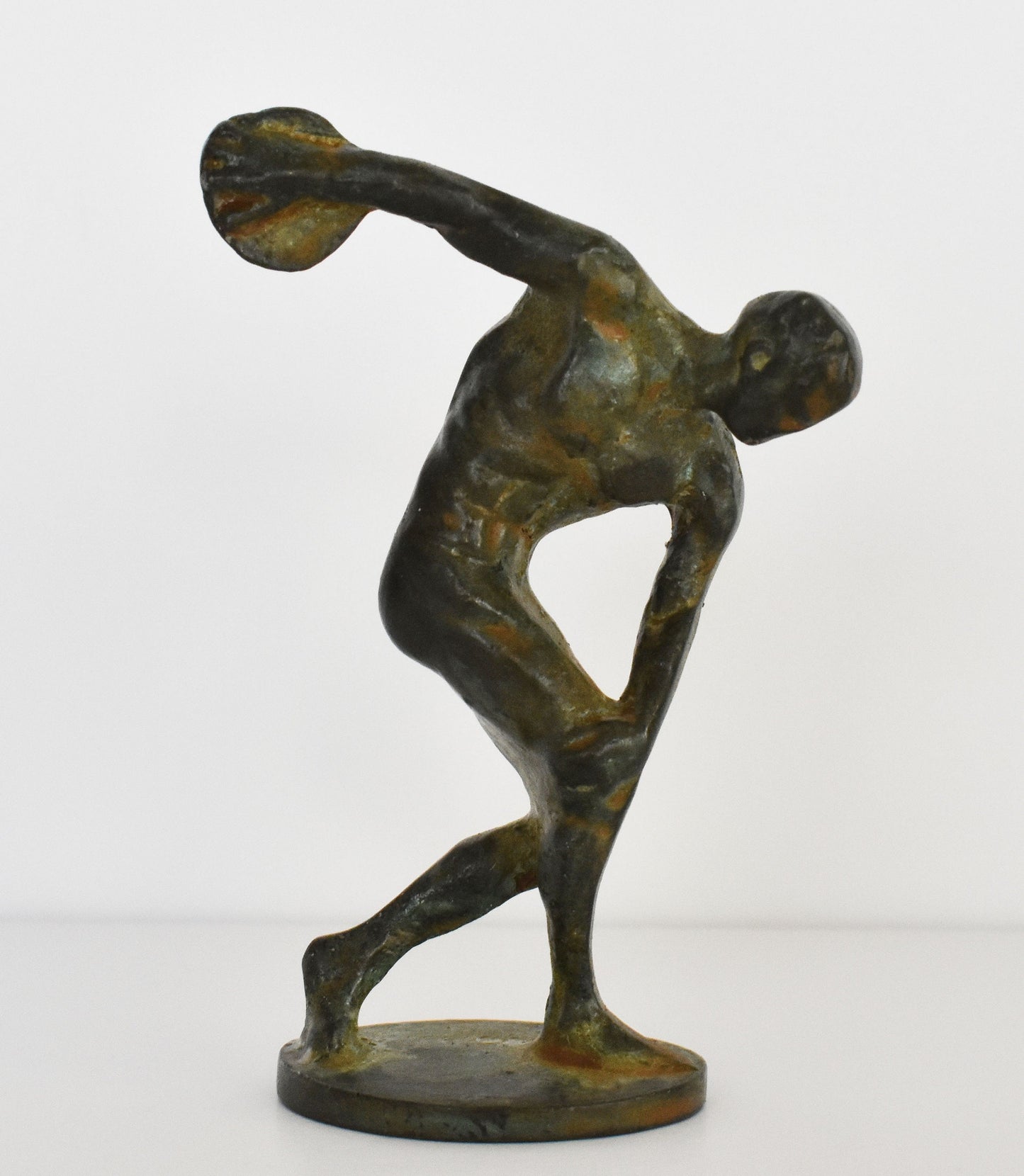Discobolus of Myron - A heightened awareness of human potential, a belief that man is the measure of all things- pure Bronze Statue