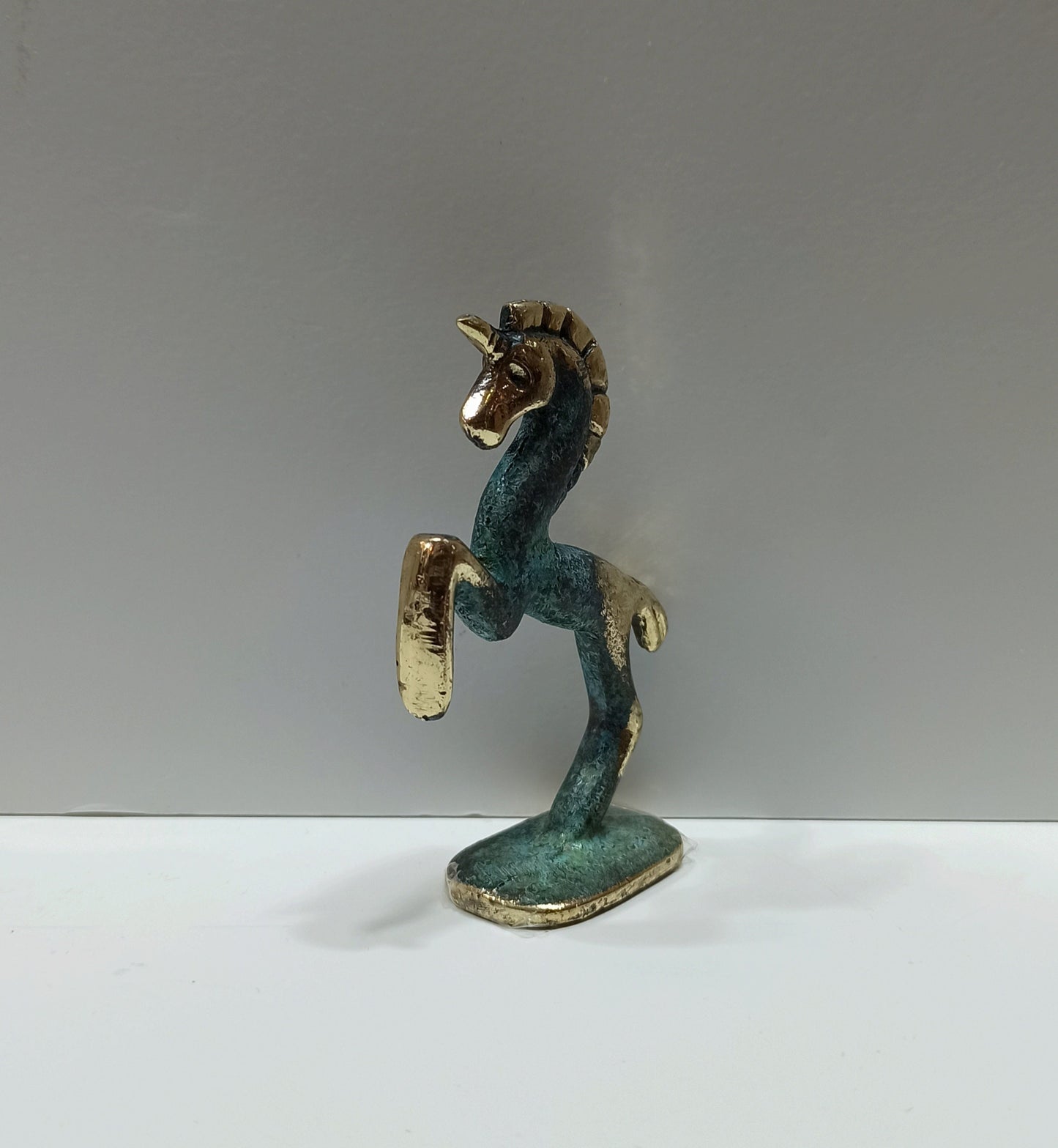 Unicorn - Legendary Creature with a single large, pointed, spiraling Horn projecting from its Forehead - Pure Bronze Sculpture