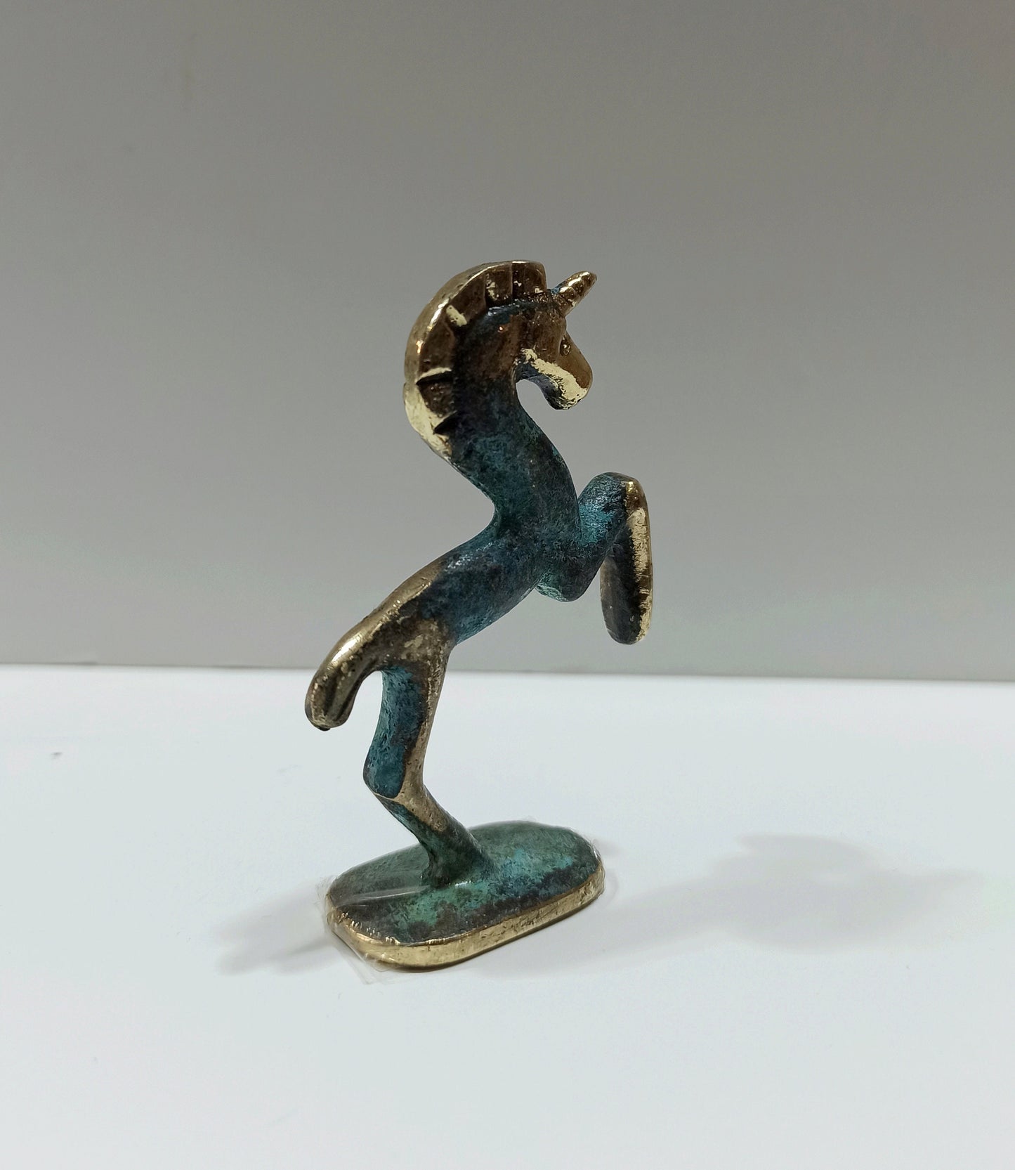 Unicorn - Legendary Creature with a single large, pointed, spiraling Horn projecting from its Forehead - Pure Bronze Sculpture