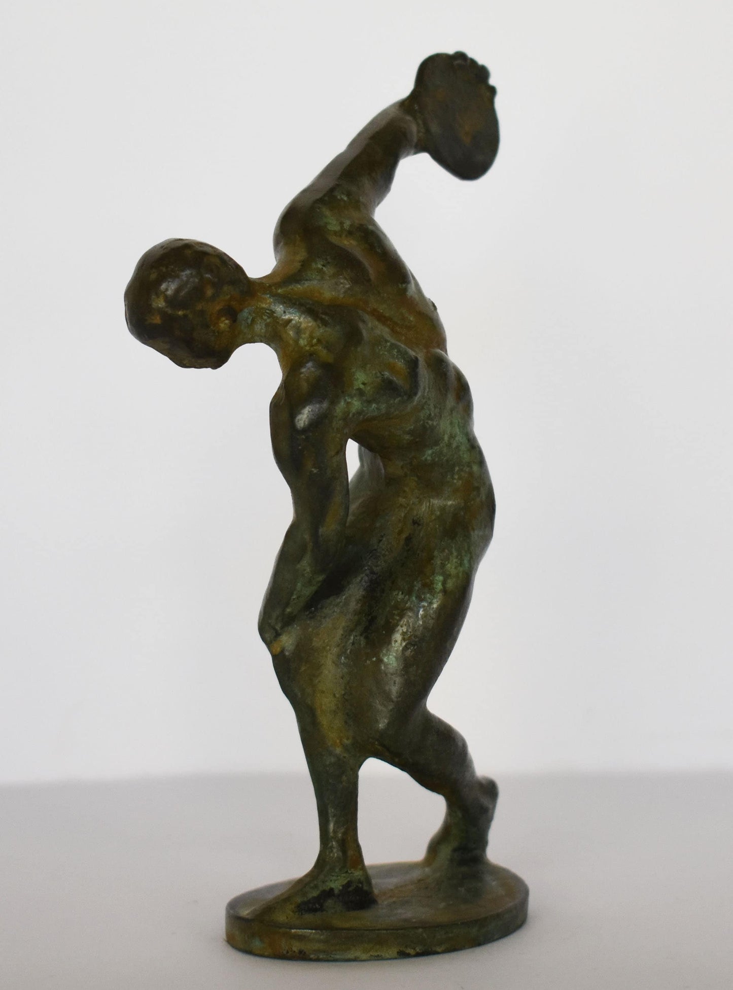 Discobolus of Myron - A symbol of status, coveted for its astonishing display of human agility and strength - pure Bronze Sculpture