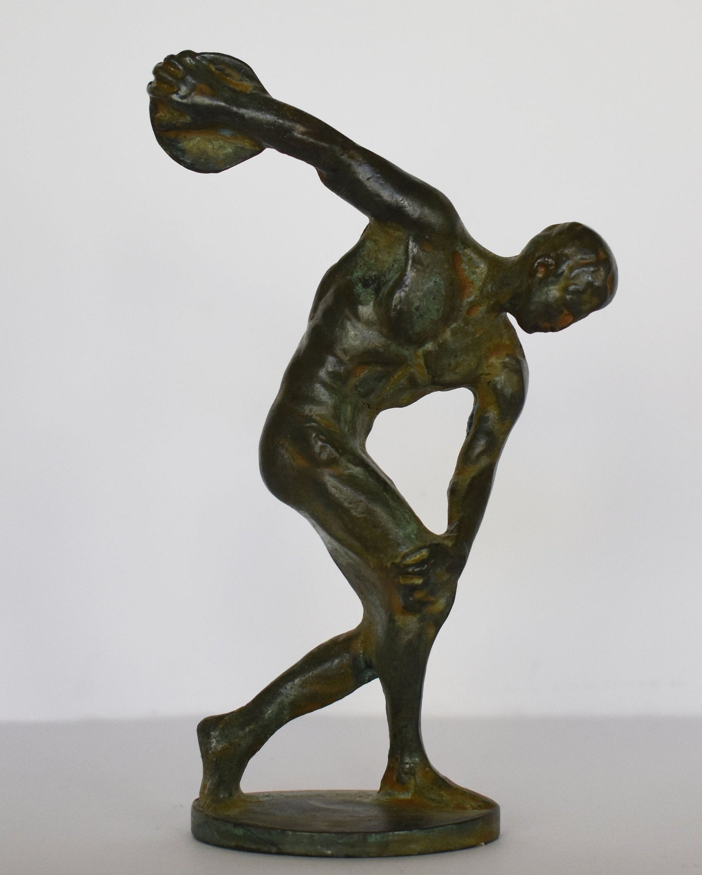 Discobolus of Myron - A symbol of status, coveted for its astonishing display of human agility and strength - pure Bronze Sculpture