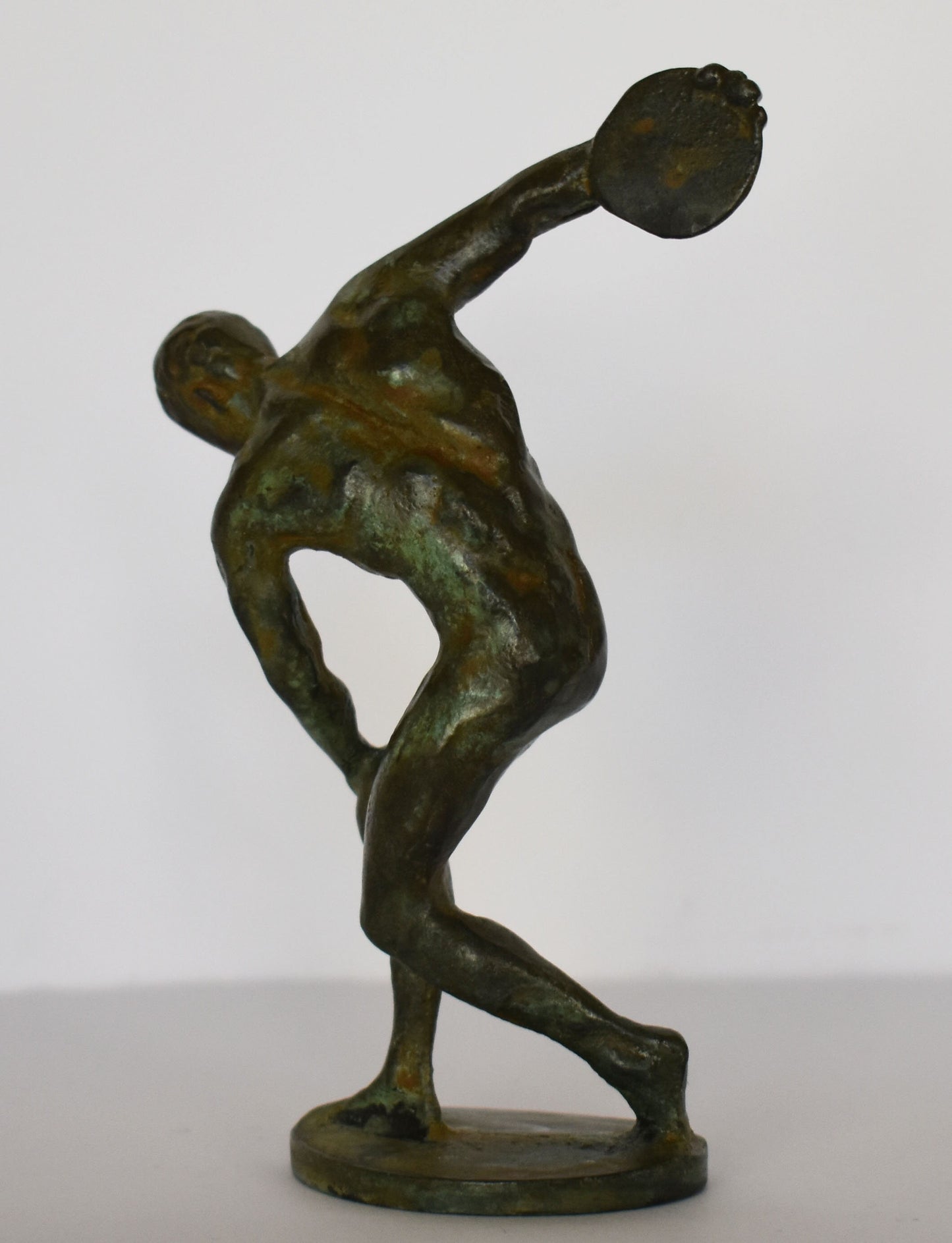 Discobolus of Myron - A symbol of status, coveted for its astonishing display of human agility and strength - pure Bronze Sculpture