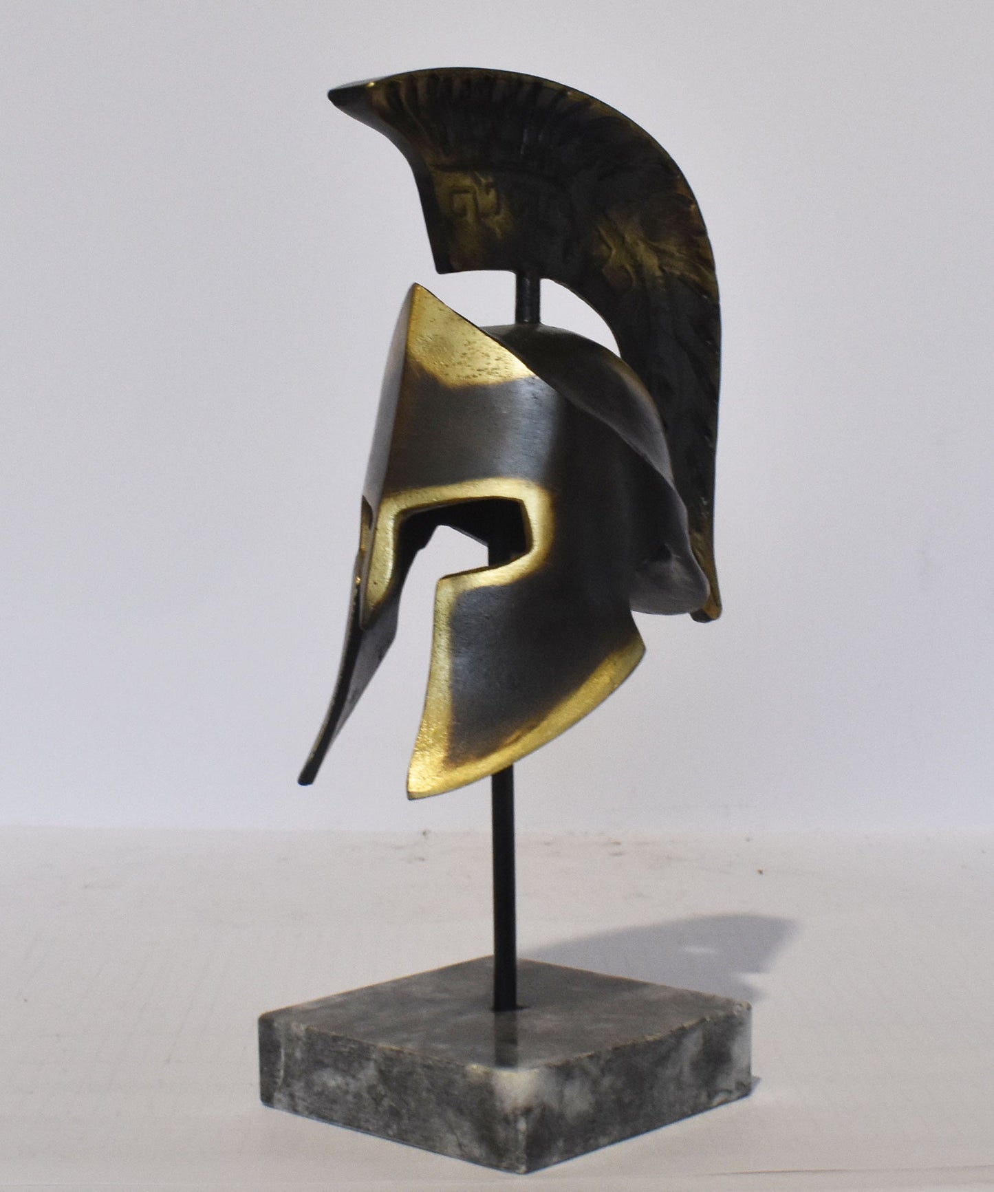 Leonida's Helmet - Spartan king - Battle of Thermopylae - one of the enduring tales of Greek heroism - marble base - pure bronze  statue