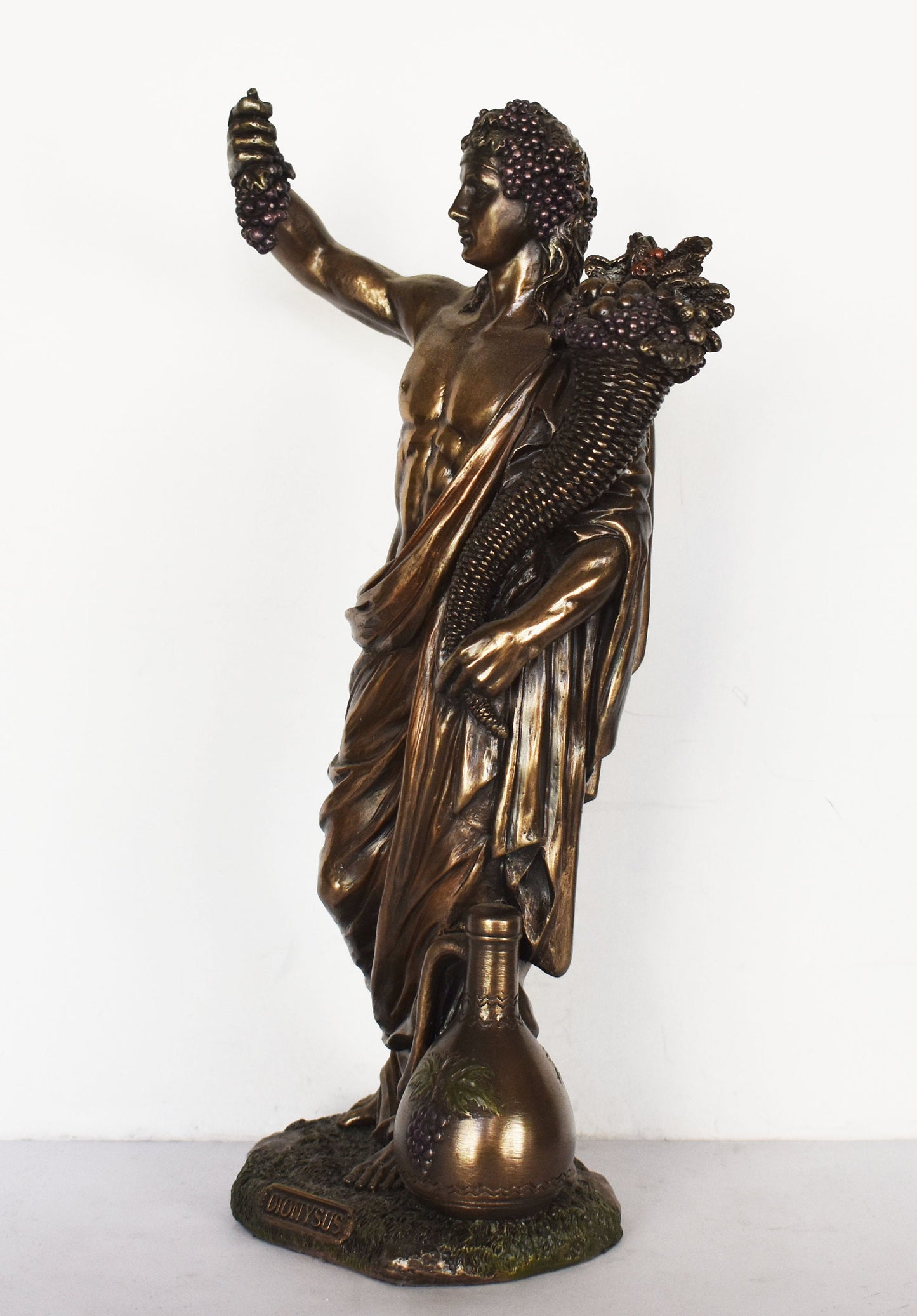 Dionysus Bacchus - God of wine and grape harvest - Represented the wild and carefree aspects of Greek society - Cold Cast Bronze Resin