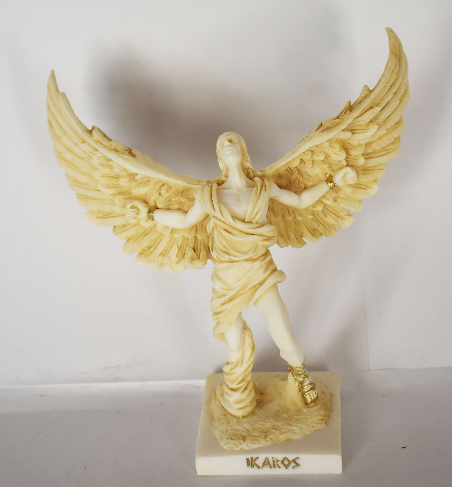 Icarus - Son of Daedalus - Escape from Crete with Wings from Wax and Drowned - Don't Fly Too Close to the Sun - aged alabaster statue