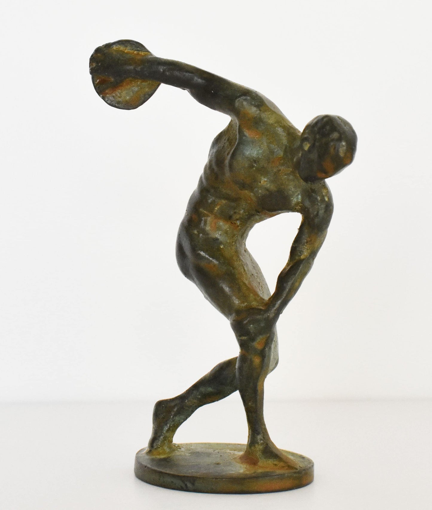 Discobolus of Myron - A heightened awareness of human potential, a belief that man is the measure of all things- pure Bronze Statue