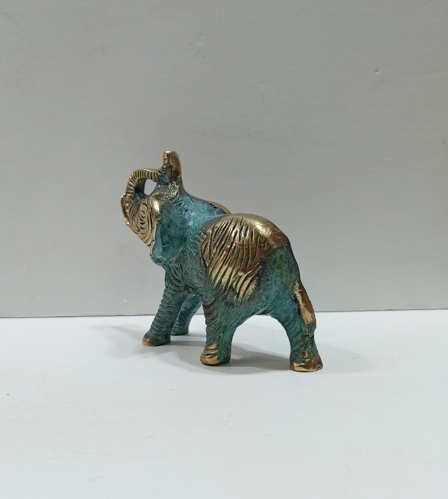 Elephant - social animal, living in herds with relatives - Symbol of strength, good fortune, health and happiness - Pure Bronze Statue