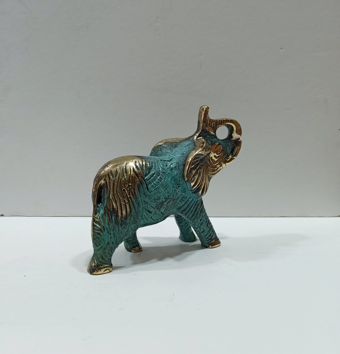 Elephant - social animal, living in herds with relatives - Symbol of strength, good fortune, health and happiness - Pure Bronze Statue