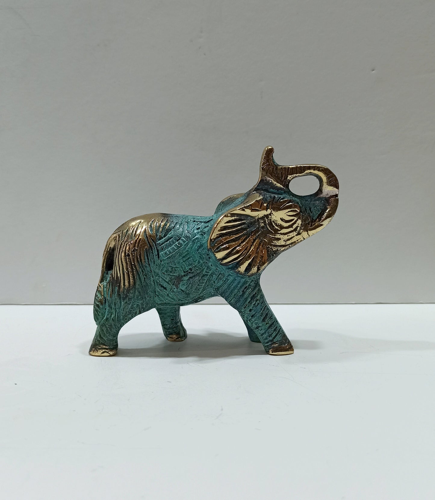 Elephant - social animal, living in herds with relatives - Symbol of strength, good fortune, health and happiness - Pure Bronze Statue